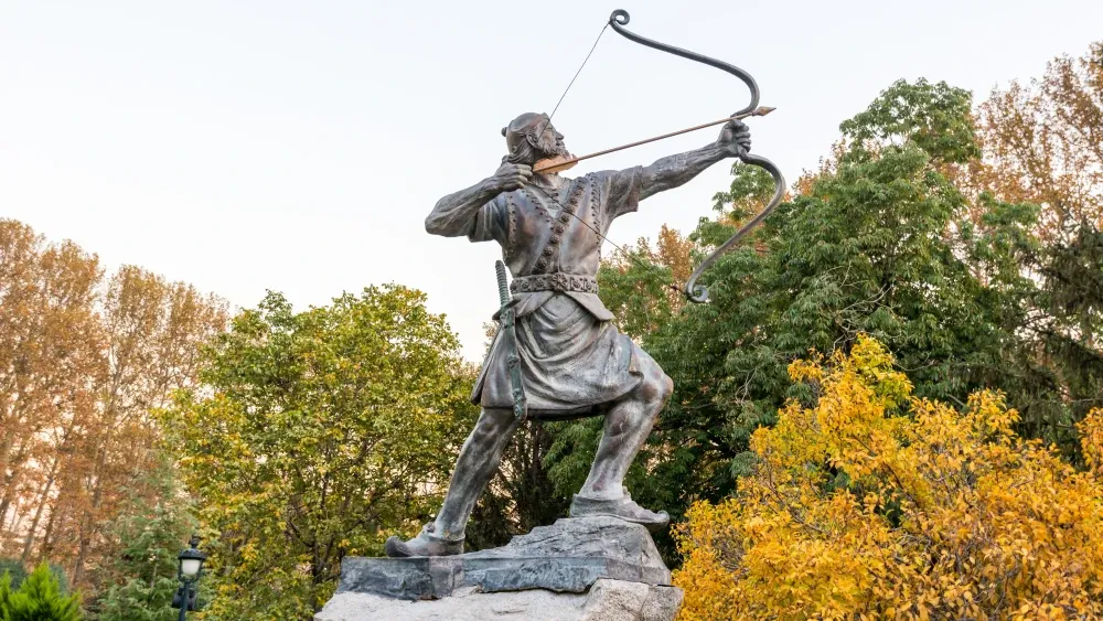 A statue of Arash Kanmadar—Arash the Archer—a mythic heroic archer from the religious texts of Zoroastrianism, in the Sa'dabad palace complex built by the Qajar and Pahlavi monarchs.  Shutterstock