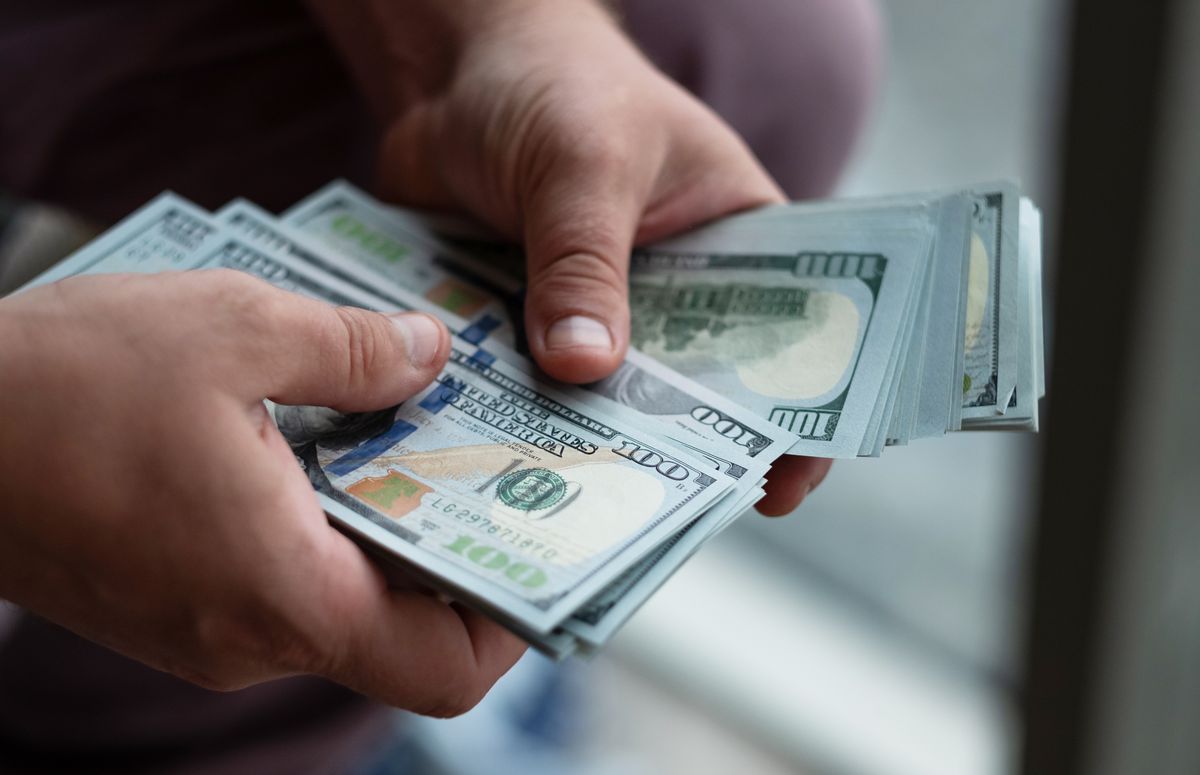 Hundred dollar bills.