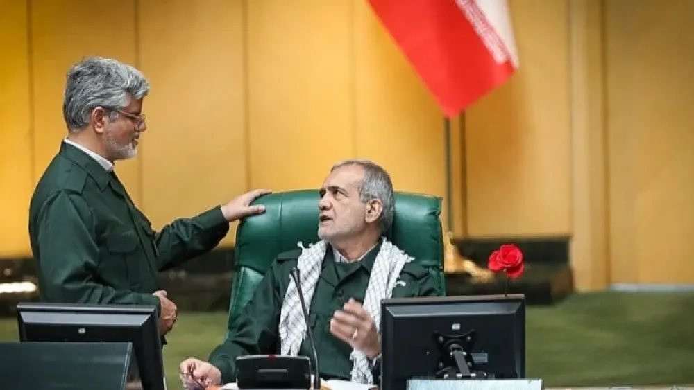 Iranian MP Mahmoud Sadeghi (left) and Masoud Pezeshkian (right) wearing IRGC uniforms