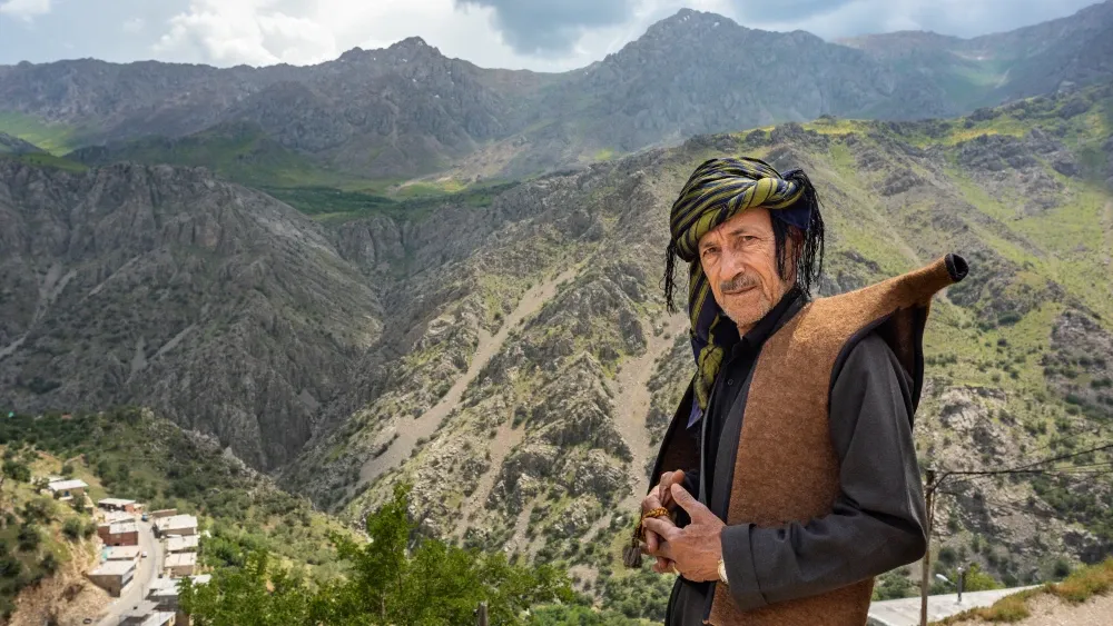 A Kurdish man wearing traditional garb in Howraman Valley, Kurdistan. Shutterstock