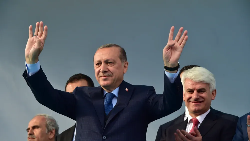 Turkish President Recep Tayyip Erdoğan, seen here making the pro-Muslim Brotherhood Rabia sign in 2017, had Turkish security forces arrest Istanbul Mayor Ekrem İmamoğlu on March 19, 2025. Shutterstoc...