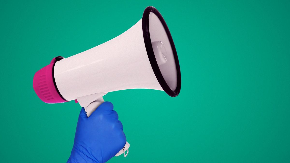Illustration of gloved hand holding a megaphone.